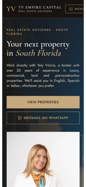 Portada de YV Empire Capital en celular, con botones para ver propiedades y escribir por WhatsApp.